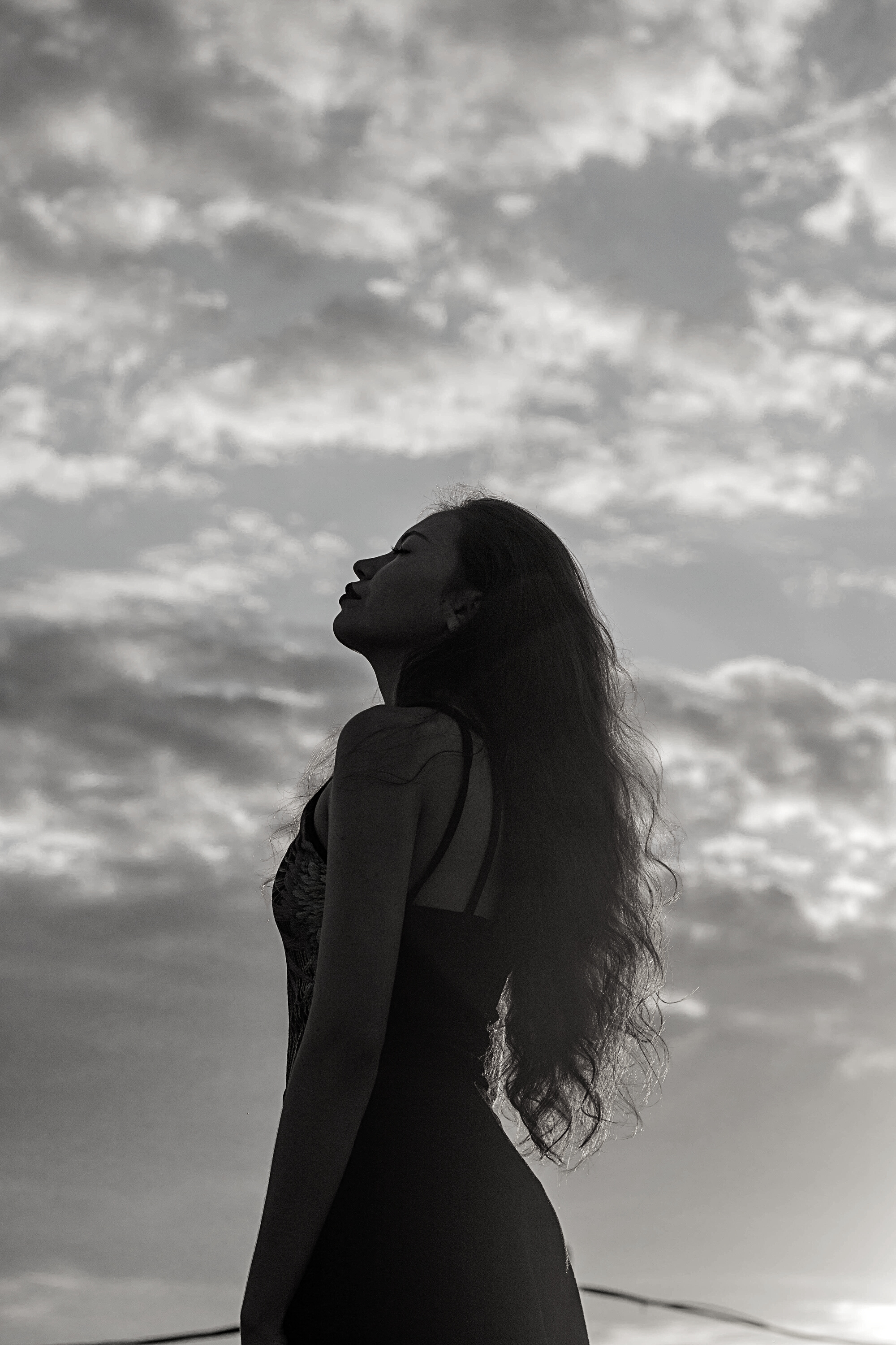Woman Standing and Facing Left Side